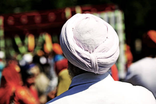 istock Sikh man with pink turban and long white beard 954539976