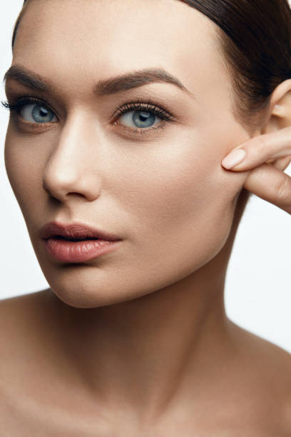 istock Elastic Skin. Woman With Beautiful Face. 954545436