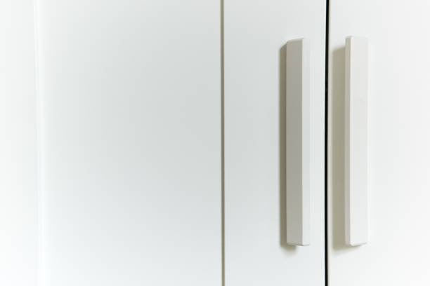 istock Modern white wooden wardrobe in the room 954552618