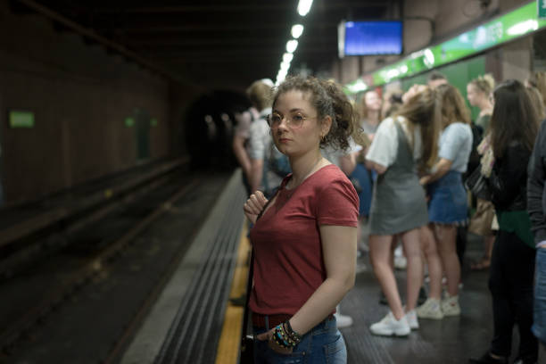 istock Sad, Young Woman Waiting for the Metro Train 954553754
