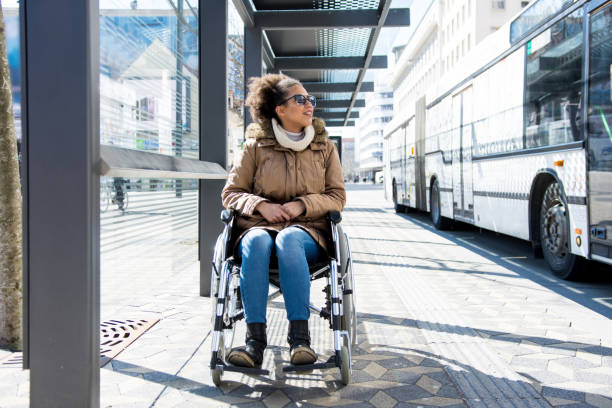 istock Disabled woman waiting at the bus station 954558030