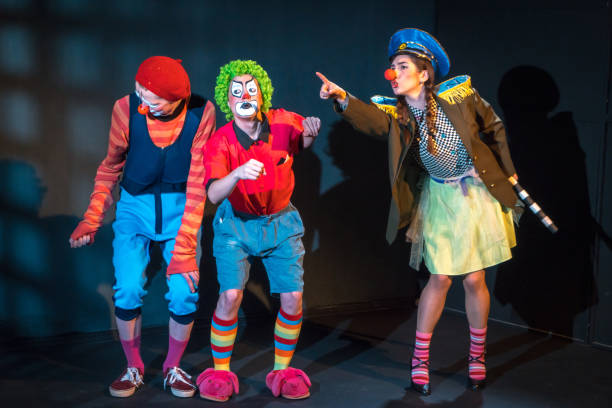 istock Policewoman Clown Is Catching Traffic Offenders 954568630