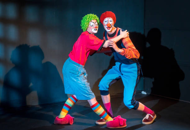 istock Male Clowns Performing Paired Dance 954568680
