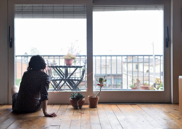 istock sadness woman at home 954569946