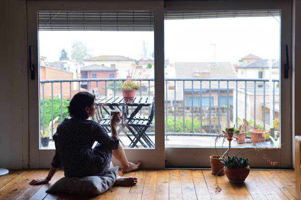 istock sadness woman at home 954570020