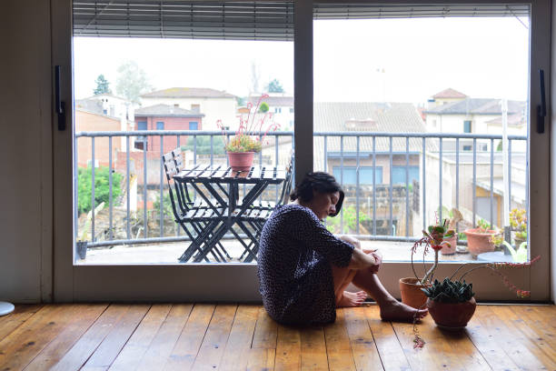 istock sadness woman at home 954570082