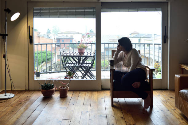 istock sadness woman at home 954570222