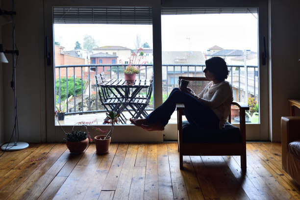 istock sadness woman at home 954570224