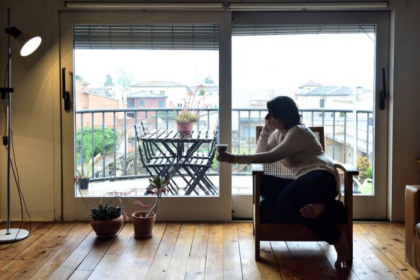 istock sadness woman at home 954570340