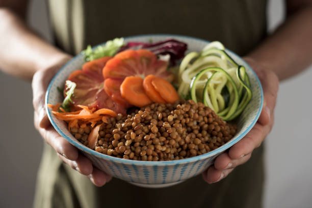 young man with a buddha bowl