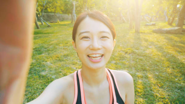 istock young woman smile take selfie 954591246