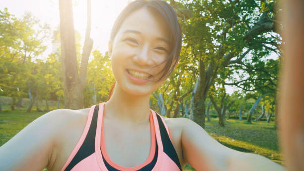 istock young woman smile take selfie 954591262