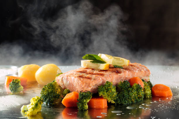 istock Salmon and steamed vegetables. 954596578