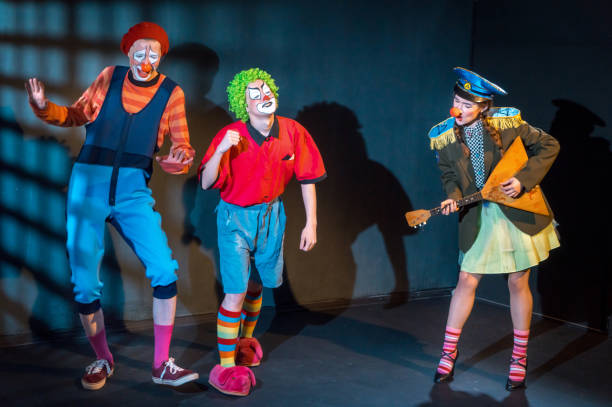 istock Playing the Balalaika. Clowns are Having Fun 954602522