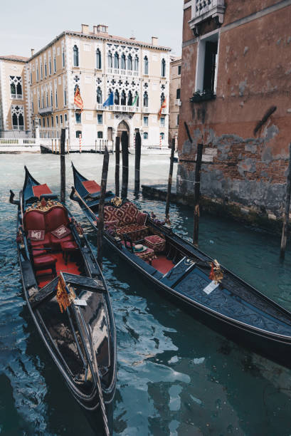 istock Two gondolas parked on Grand Canal. Venice, Italy. 954602850