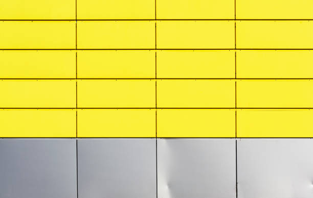 istock fragment of a yellow iron wall made of rectangular blocks 954605384