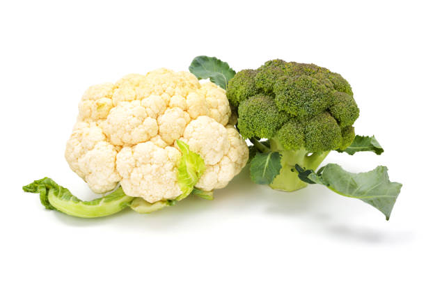 istock Ripe broccoli and cauliflower crops on leaves 954616470