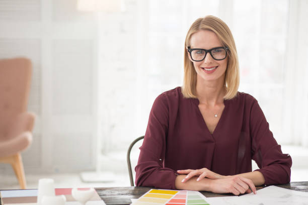 istock Attractive happy businesswoman working for herself 954616640