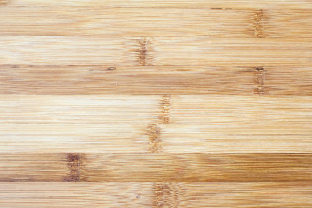 istock Board made of natural bamboo wood. Textures pattern background in light yellow cream beige brown color. 954617832