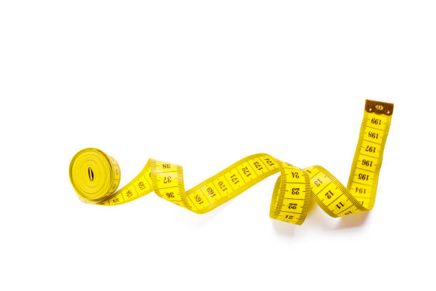 istock yellow metric measuring tape isolated on white panorama background 954630968
