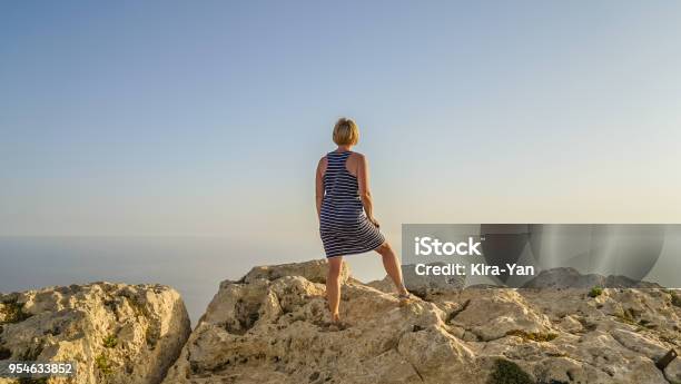 Middleaged Woman Looks Into Distance Stock Photo - Download Image Now - Active Lifestyle, Adult, Adults Only