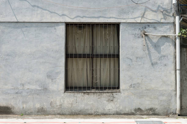 istock sidewalk by street wall & door 954634440