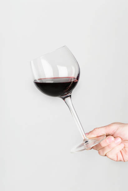 istock GLASS OF WINE IN HAND 954635558
