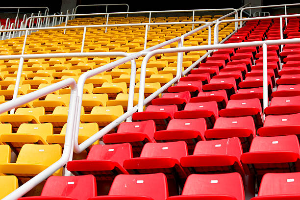 istock Red and yellow stadium seats 95464062