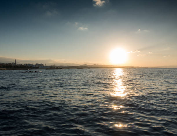 istock Sunset over ocean, Chania, Crete, Greece 954640942