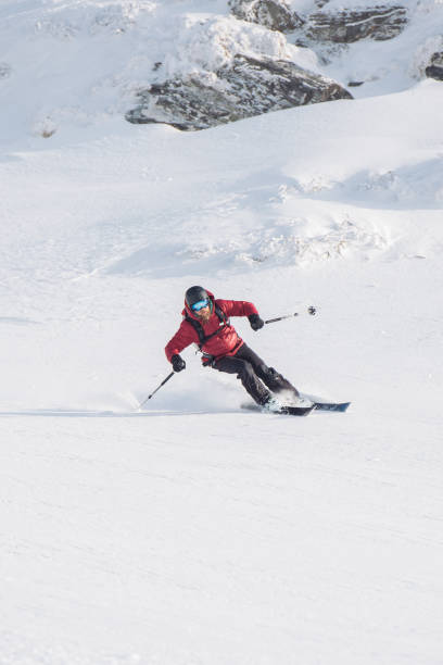 istock Skier carving on the ski slope 954641194