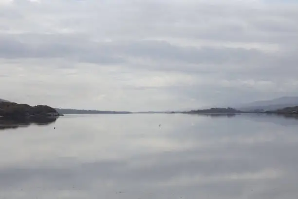 Photo of Kenmare Bay a natural tidal inlet surrounded on both sides by mountains