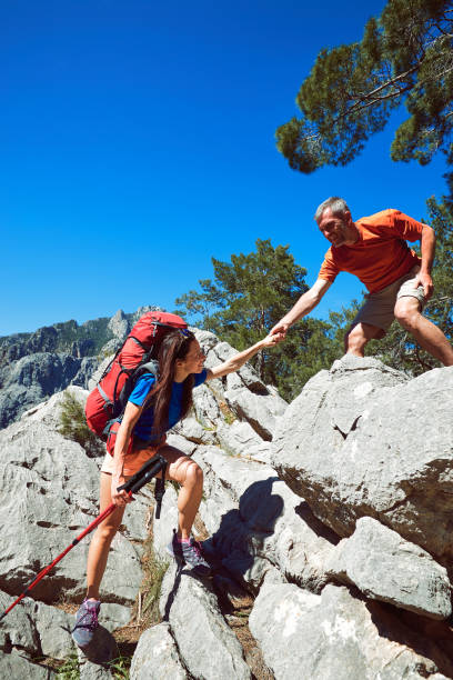 istock A helping hand high in the mountains in the summer hike 954646884