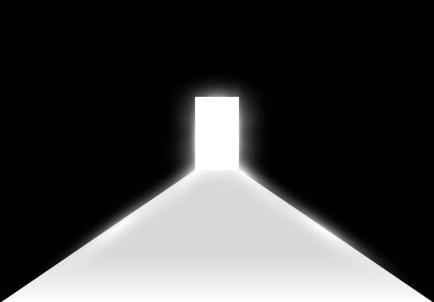 istock Open the door in a dark room with light passing through it. Light enters through the gap on a transparent background 954647040