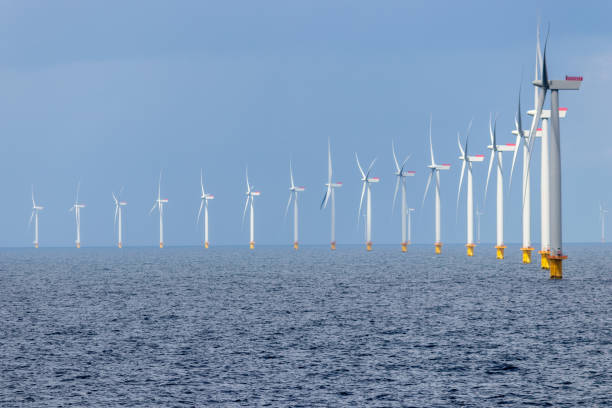 Offshore wind farm Offshore wind farm in the Kattegat sea outside Denmark. offshore wind farm stock pictures, royalty-free photos & images