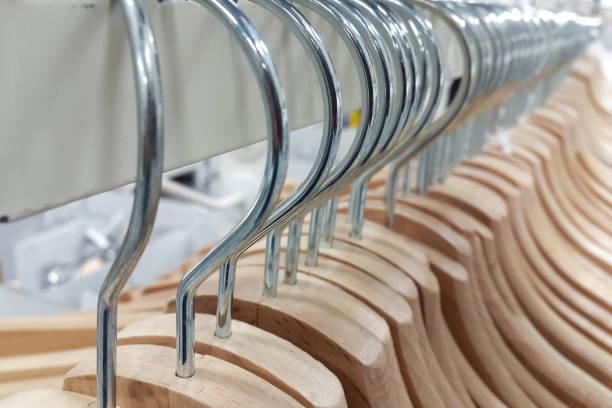istock Many Clothes Hangers on a Rack 954649710