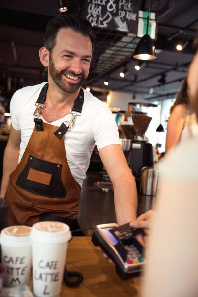 istock Paying the bill using a contactless credit card 954650082