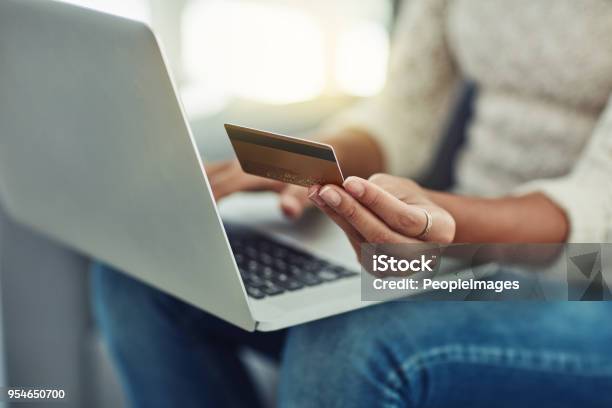 The Most Comfortable Place To Make Payments Stock Photo - Download Image Now - Credit Card, Paying, Internet