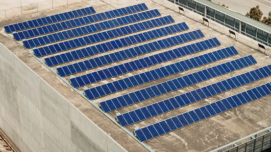 Solar panel farm set up on building roof in South Australia