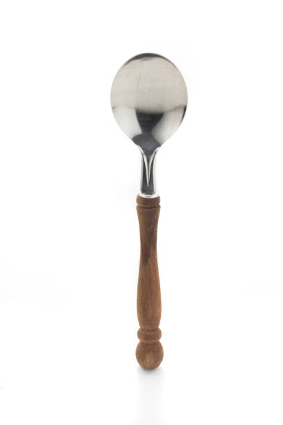istock wood spoon on isolated white background 954654816
