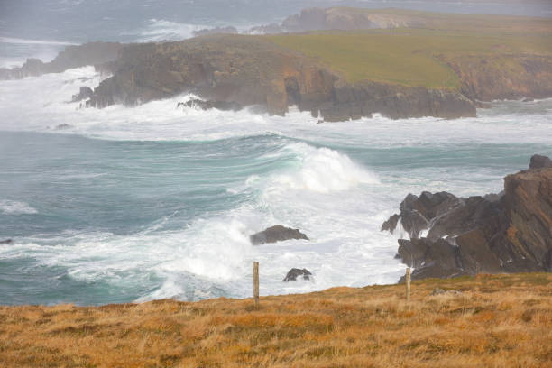 Storms from the North Atlantic reach the West Coast of Ireland first, bringing huge waves onto the shoreline on the Dingle Peninsula part of Irelands Wild Atlantic Way