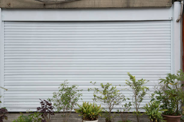 istock sidewalk by street wall & door 954666834