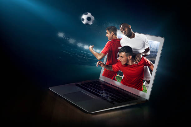 istock Soccer game on laptop. Live broadcast 954669358