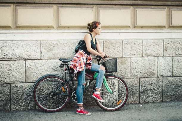 istock Young girl on a bicycle 954670362