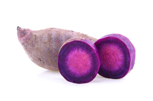 istock Purple sweet potato isolated on white background 954670468