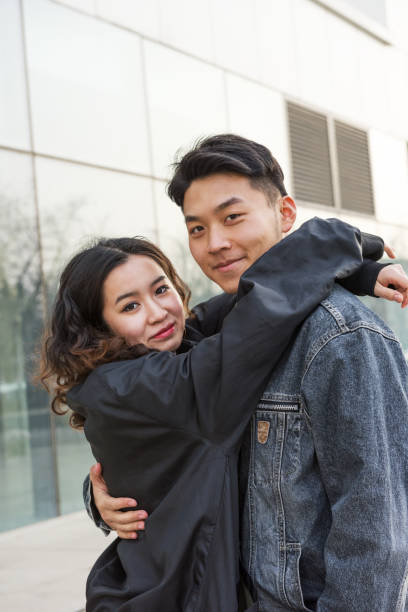 istock Happy couple embracing and smiling 954670476