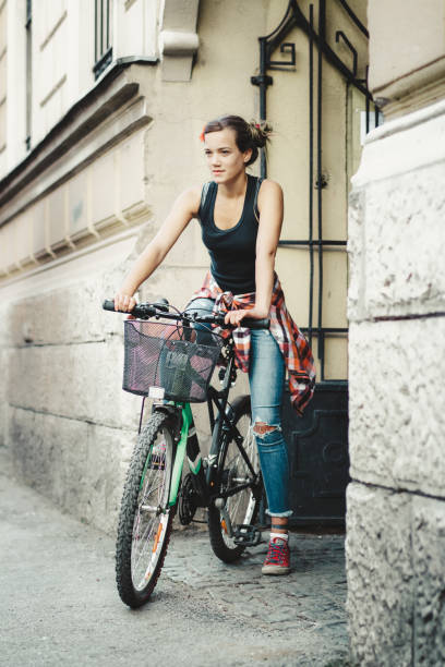 istock Young girl on a bicycle 954672450