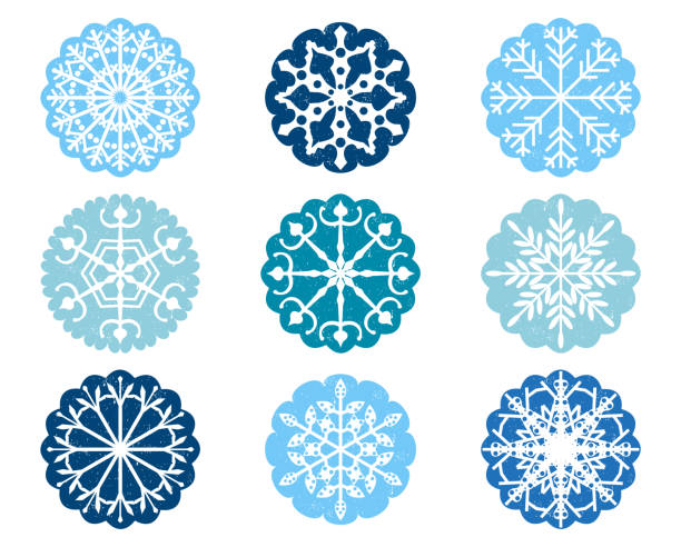 White snowflake design ornaments in blue scalloped circles for Christmas decoration White snowflake design ornaments in blue scalloped circles for Christmas decoration scalloped illustration technique stock illustrations