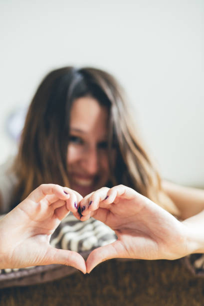 istock Charming woman lies on bed and relaxing. 954682716