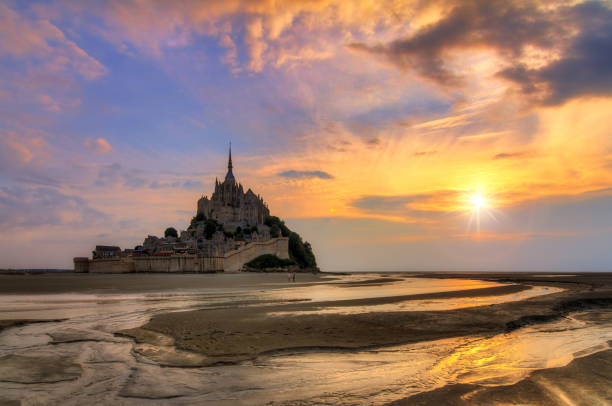 istock Low tide Le Mont Saint-Michel sunset 954683600