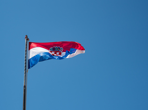 Croatian flag against blue sky